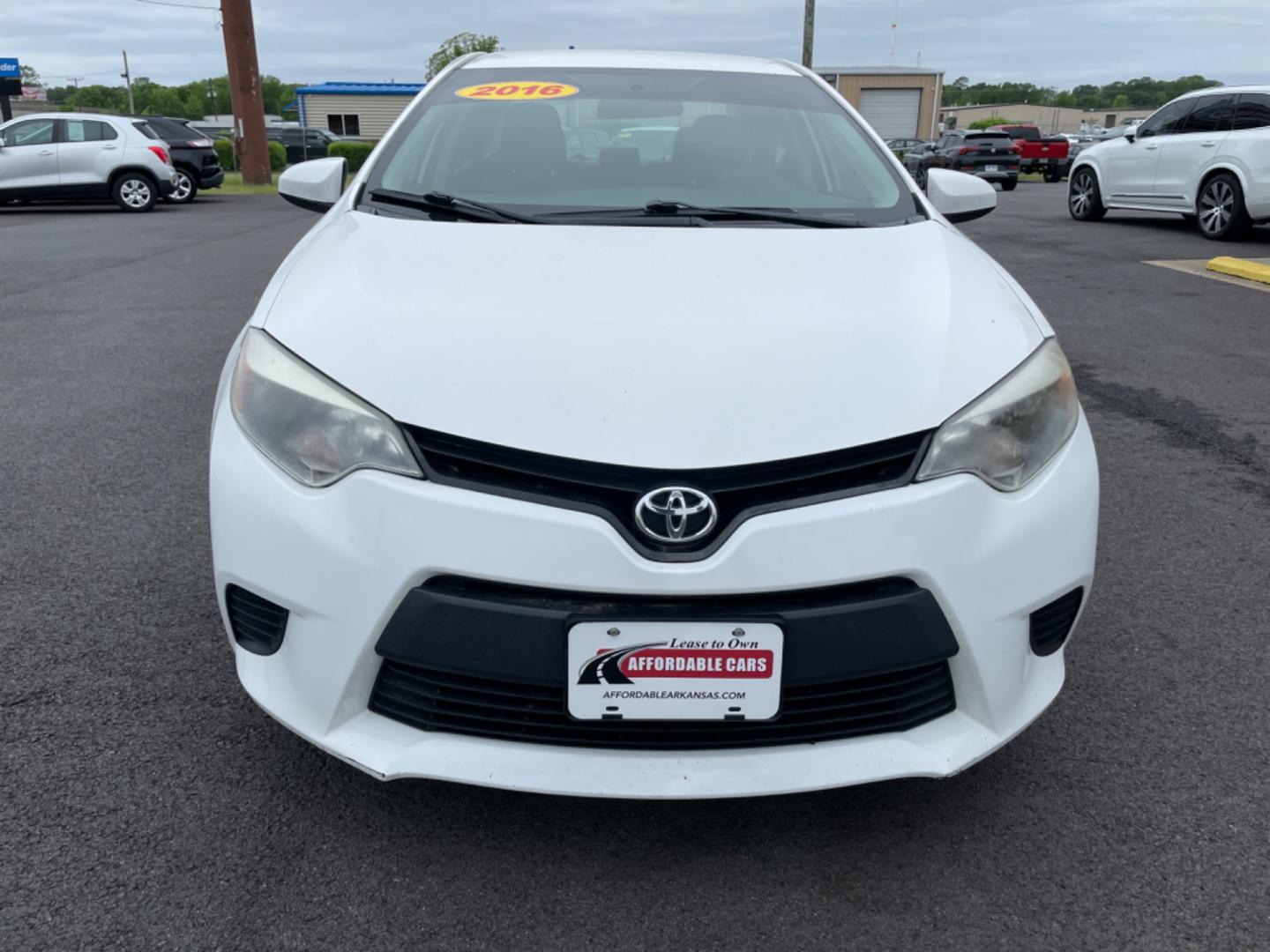 2016 White Toyota Corolla (5YFBURHE8GP) with an 4-Cyl, 1.8 Liter engine, Automatic, CVTi-S transmission, located at 8008 Warden Rd, Sherwood, AR, 72120, (501) 801-6100, 34.830078, -92.186684 - Photo#2